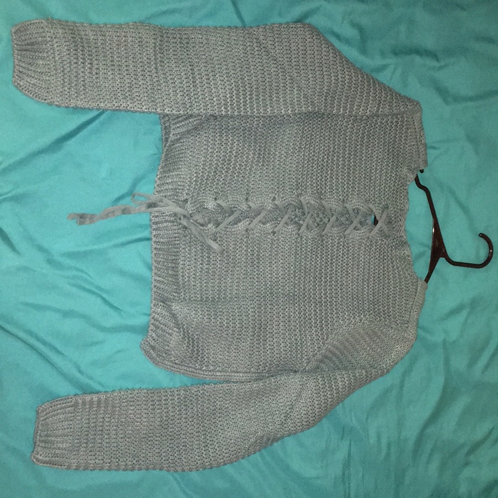 A full sleeve crop sweater